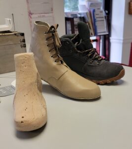 Handmade shoe last, custom inner boot for trans-metatarsal amputation patient, and hiking shoe
